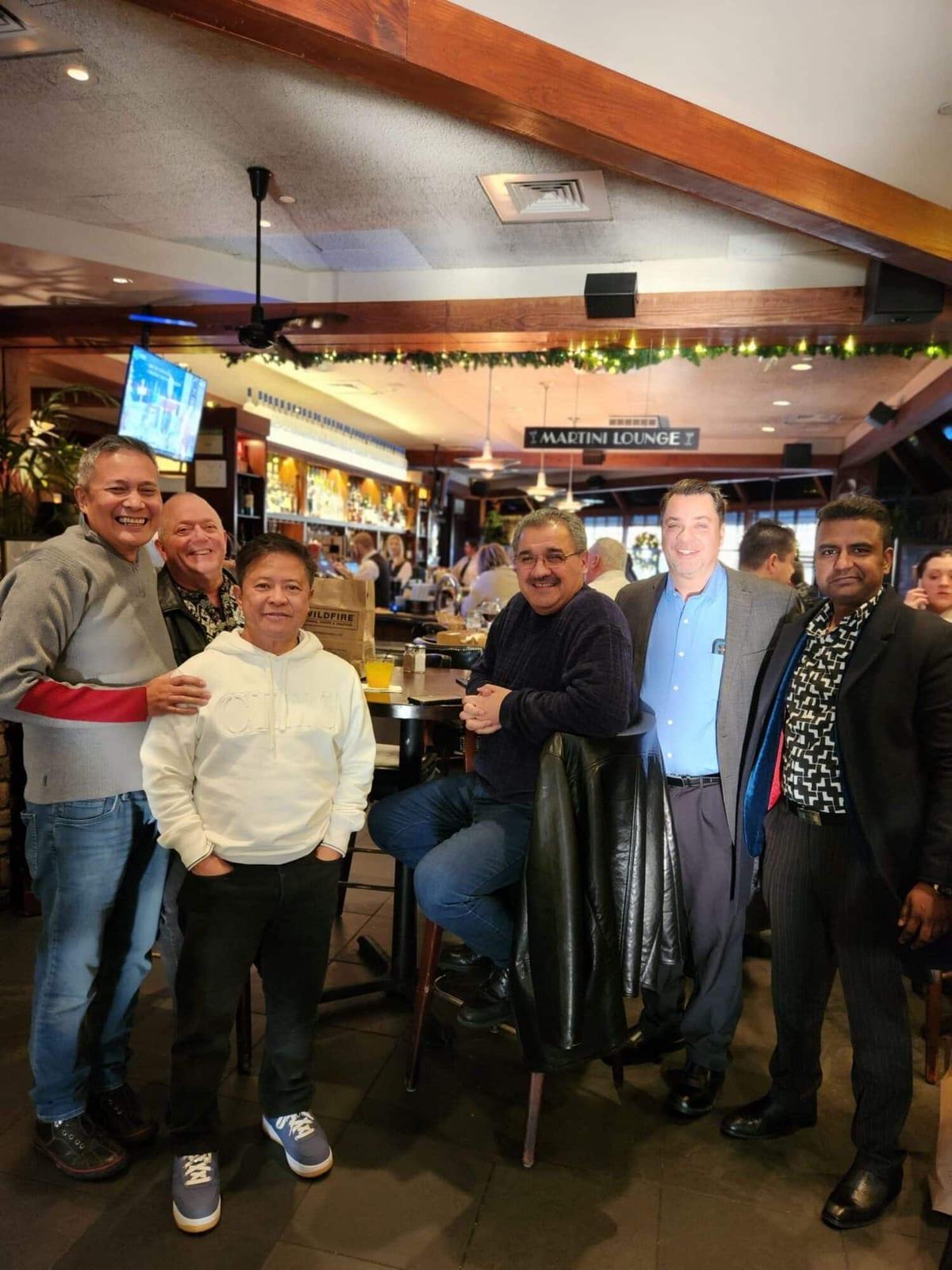 ISG teammates at a holiday lunch