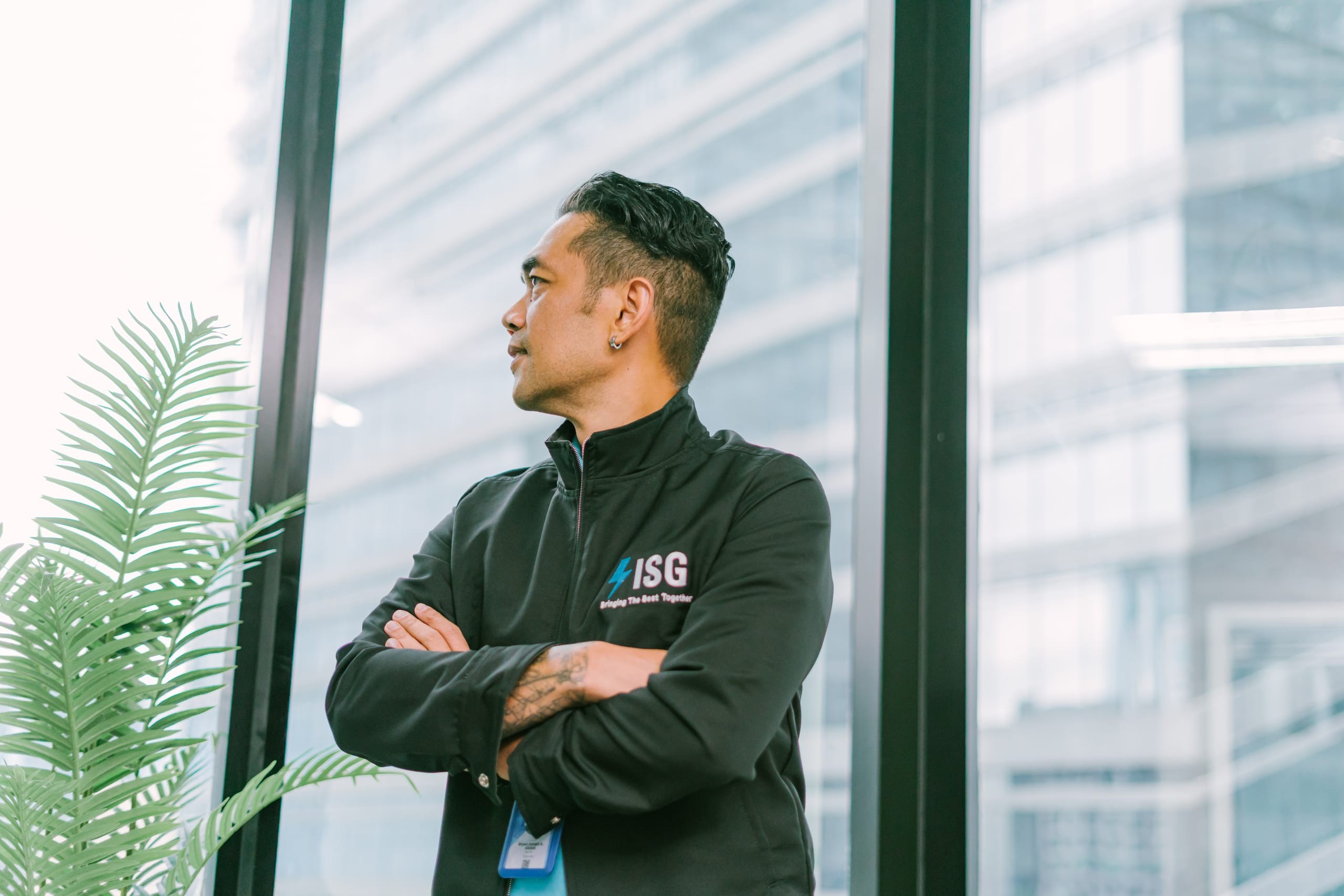 ISG consultant at the office window